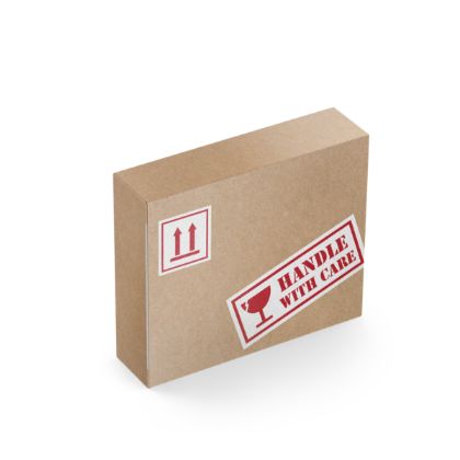 Brown package standing on its side with fragile sticker